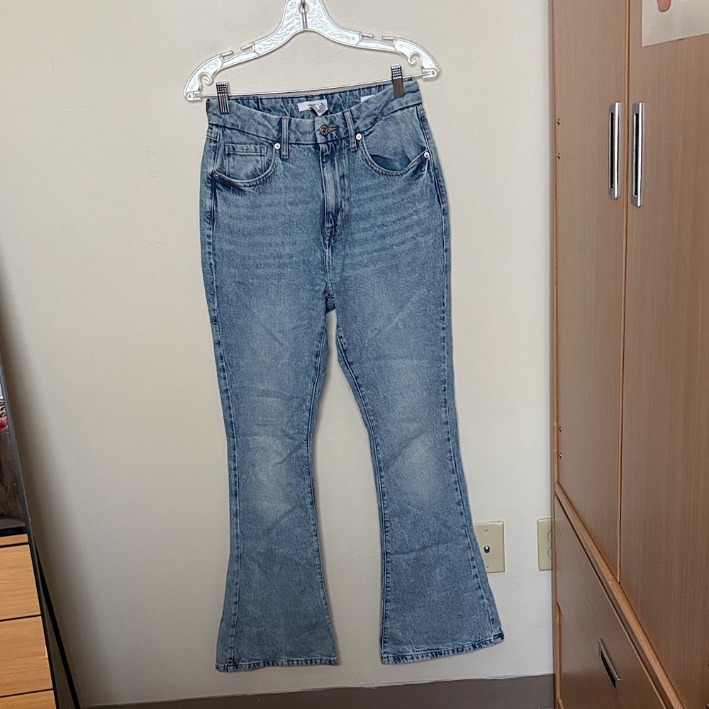 High-Waist Curved Flare Jeans